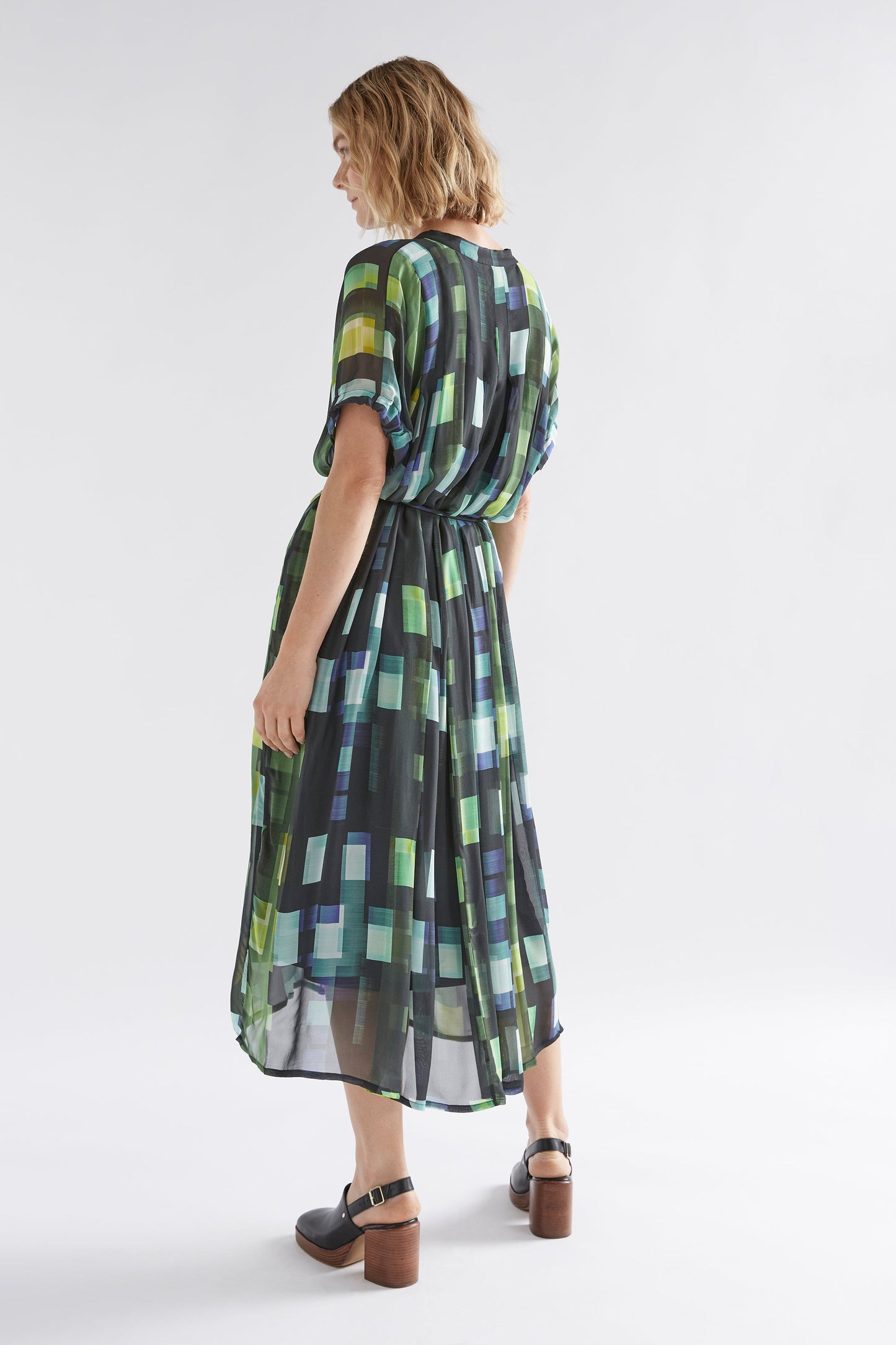 Indi Sheer Collarless Midi Shirt Dress Model Angled Back | GREEN SHUTTER GRID