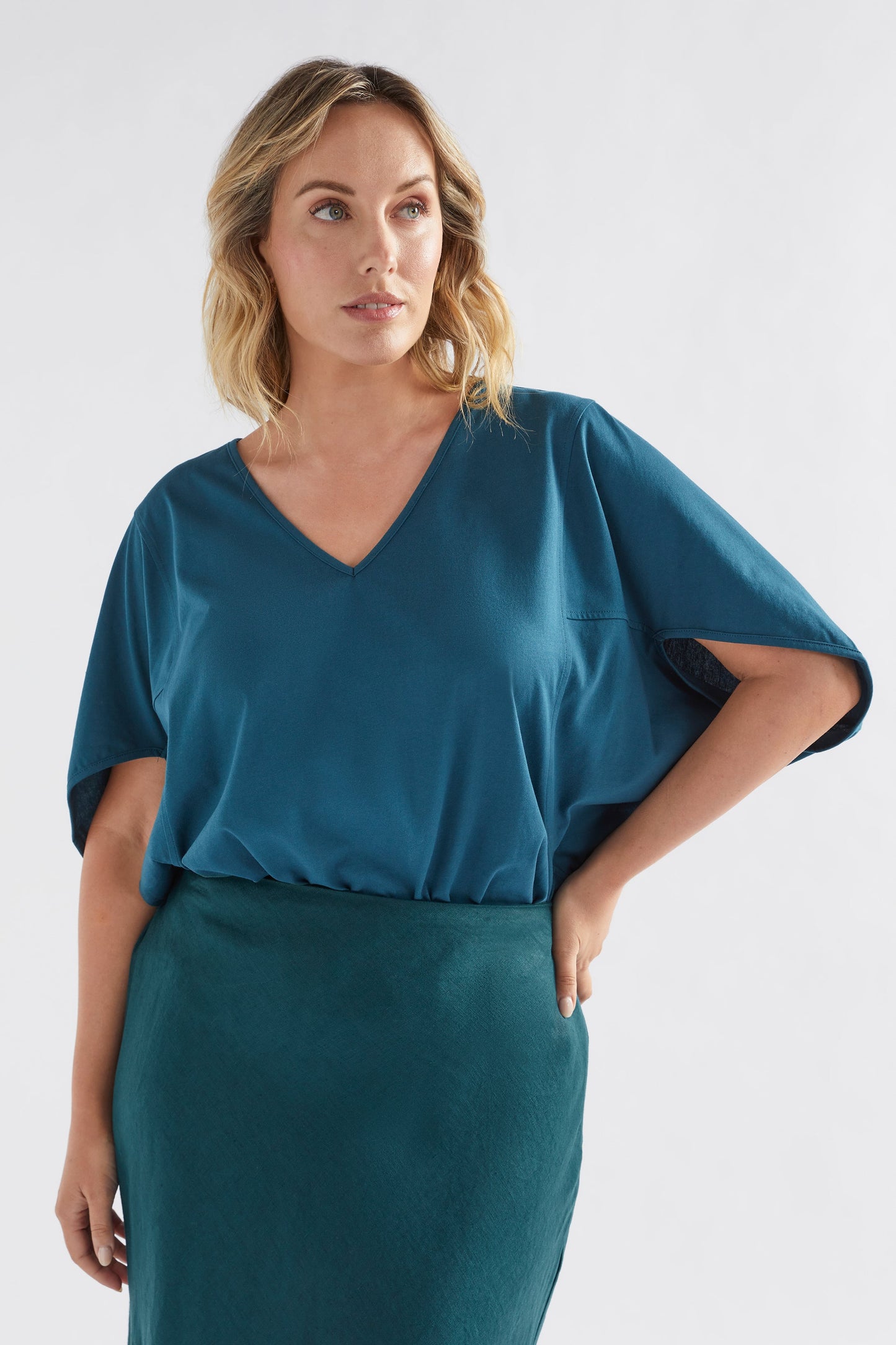Nid Organic Cotton Jersey V-neck Tee Model Front Tucked | PEACOCK
