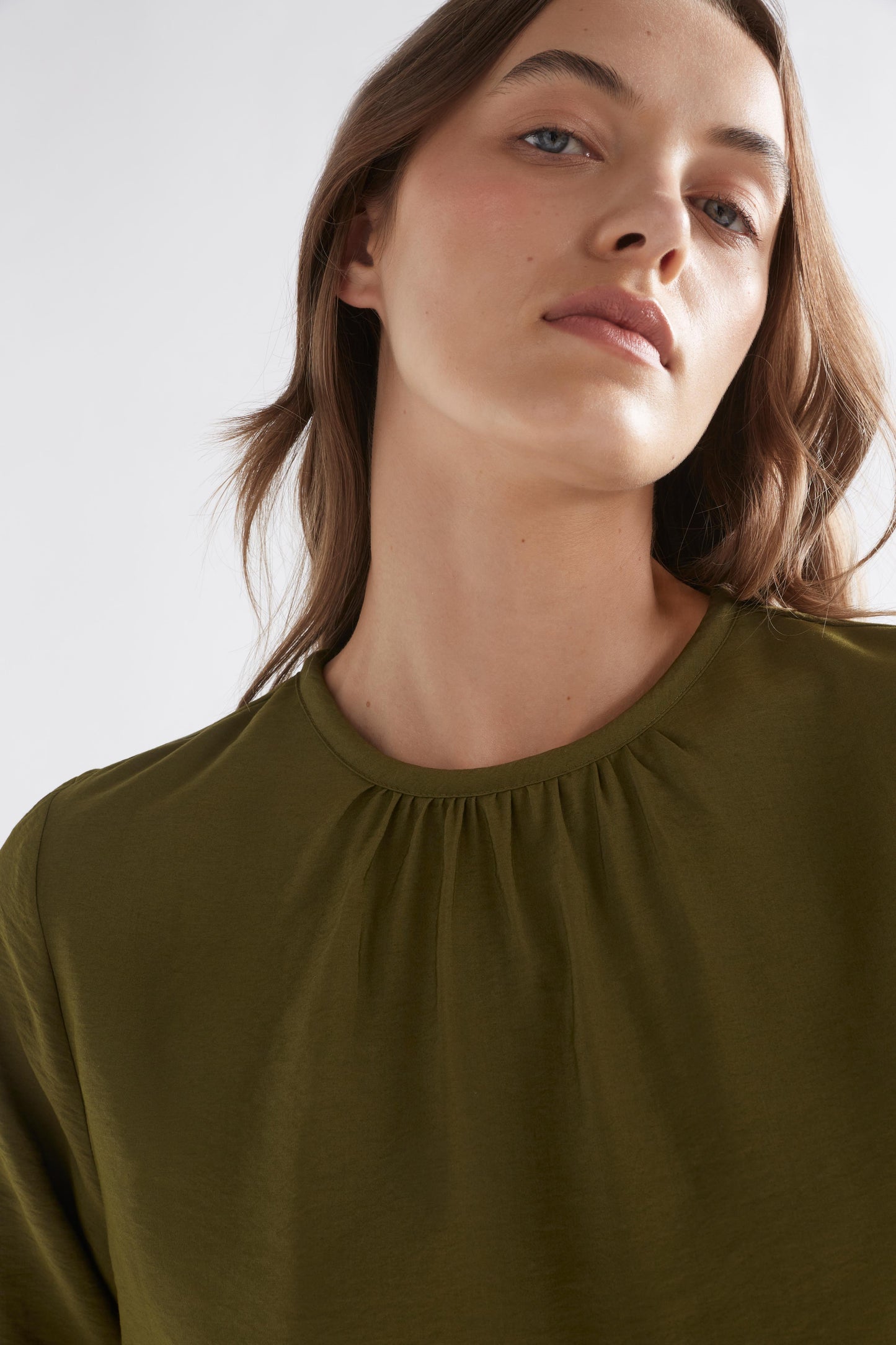 Etne Gathered High Neck Long Sleeve Top Model Front neck Detail | DARK OLIVE
