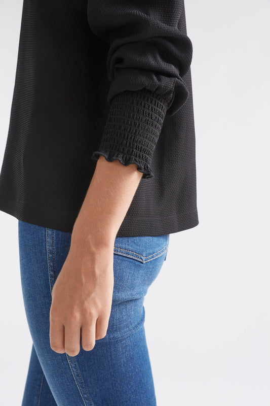 Veda Round Neck Shirred Cuff Long Sleeve Top Model Detail | BLACK