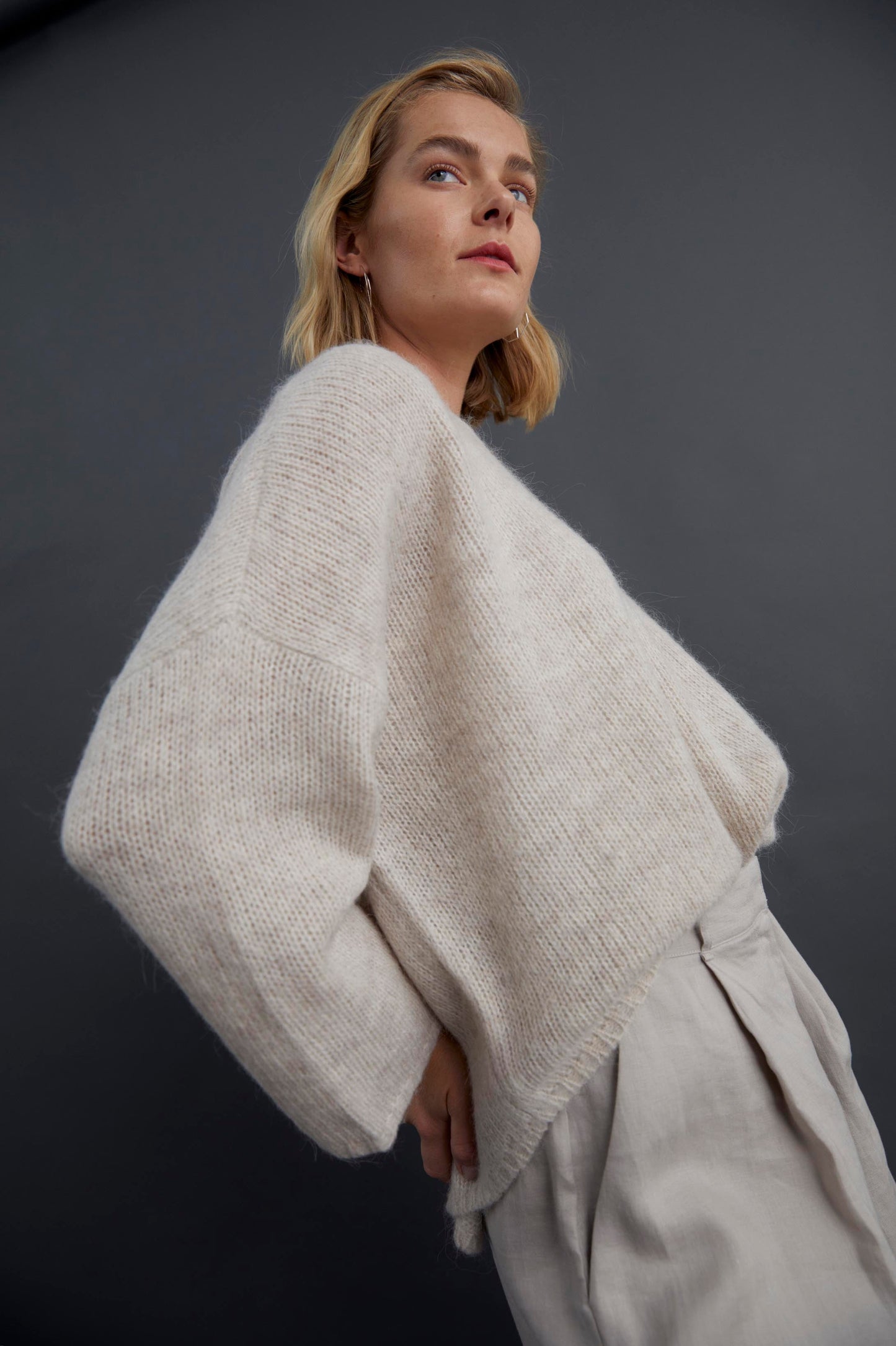 Agna Merino and Alpaca Wool Sweater Campaign Model Detail Side | ECRU