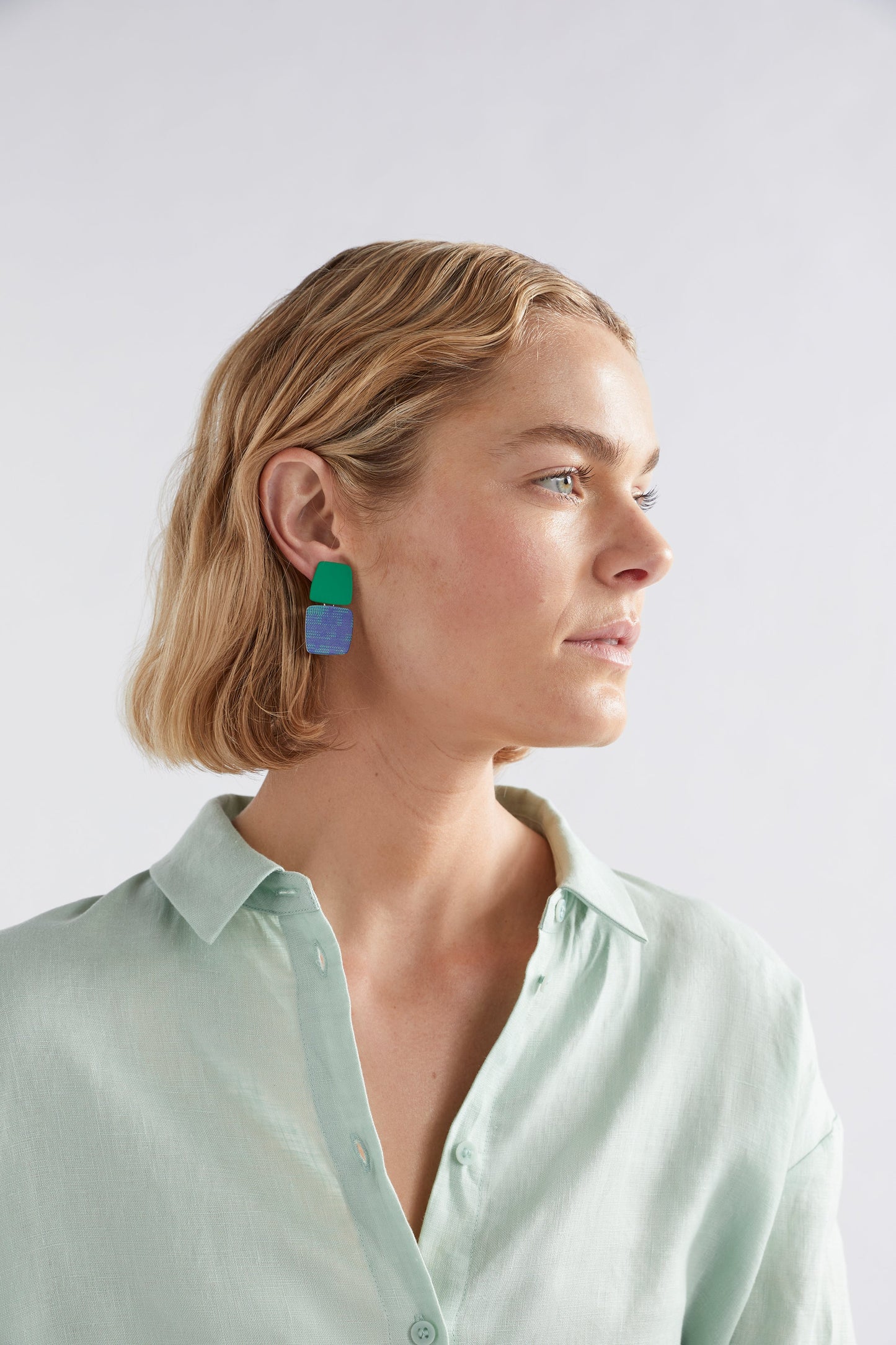 Maika Geometric Colour Coated Print Drop Earring Model | TEAL CROSS STITCH PRINT