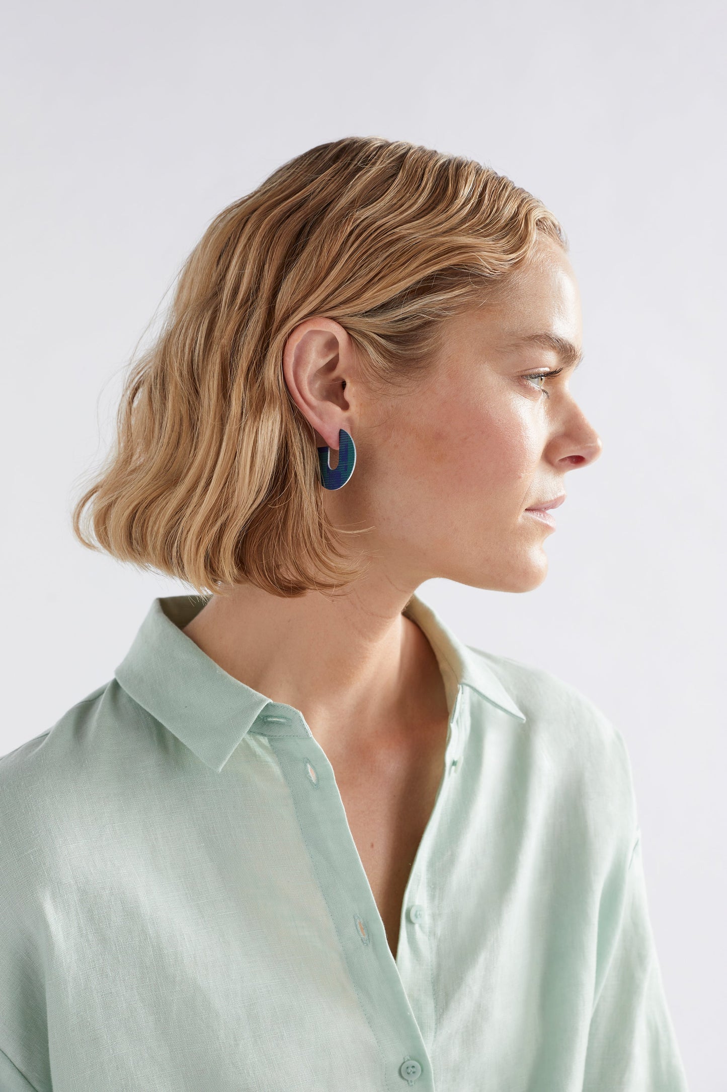 Ailani Colour Coated Stitch Print Round Stud Earring Model | TEAL CROSS STITCH PRINT
