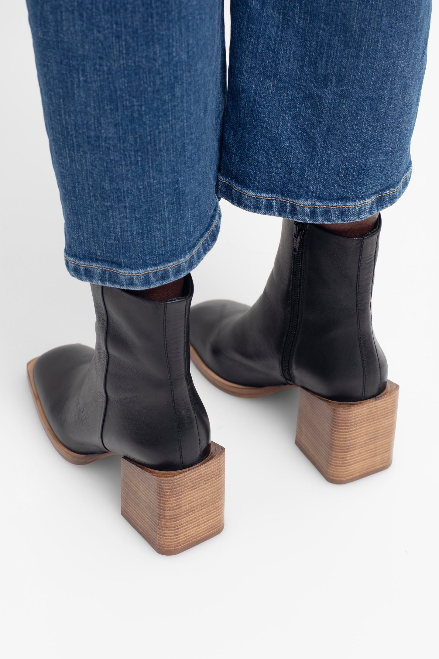 Hal Leather Square Toe Block Heel Boot Model Angled Back | BLACK