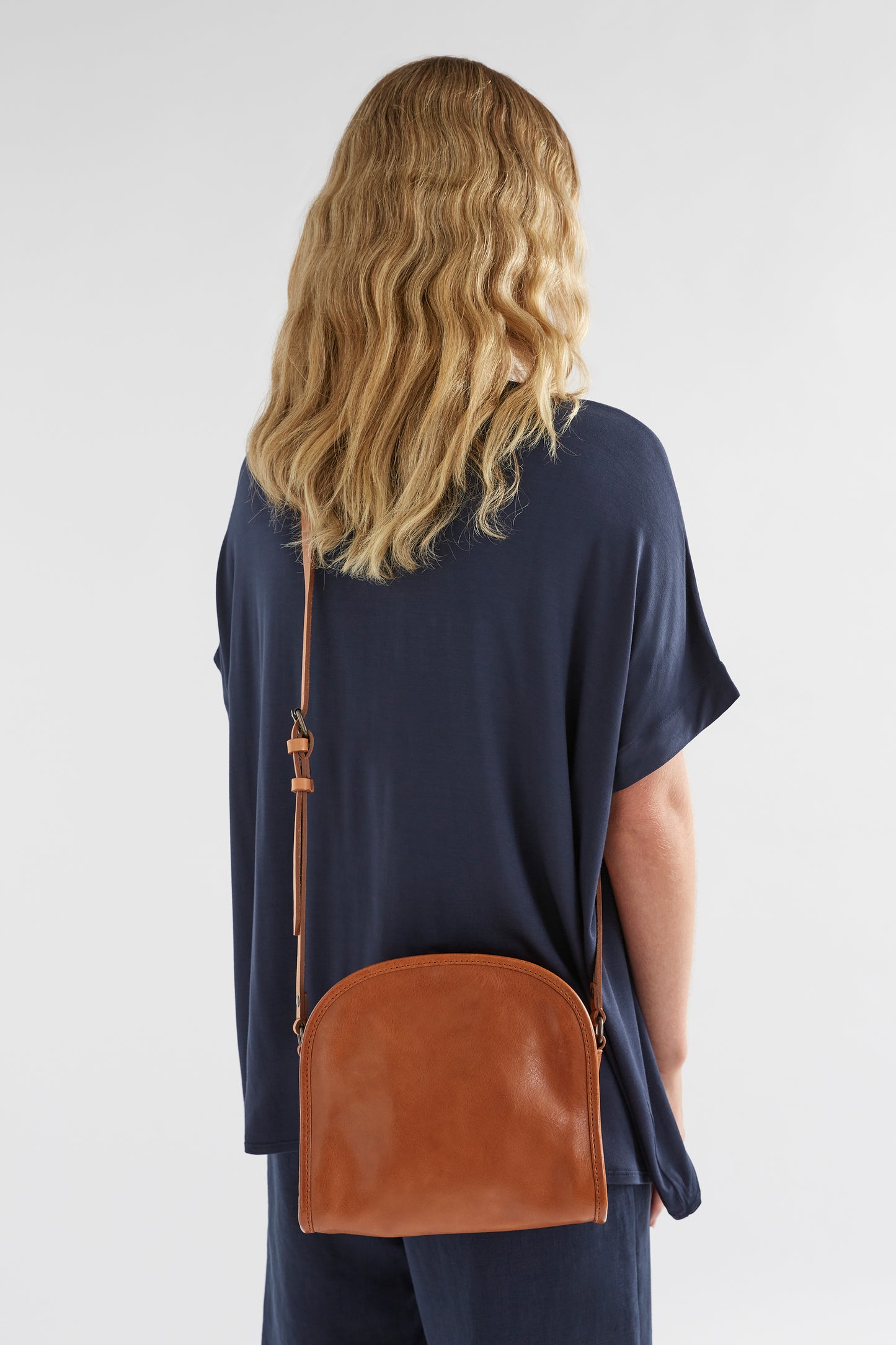 Kurva Half Moon Zip Up Leather Messenger Bag Model Front | Tan