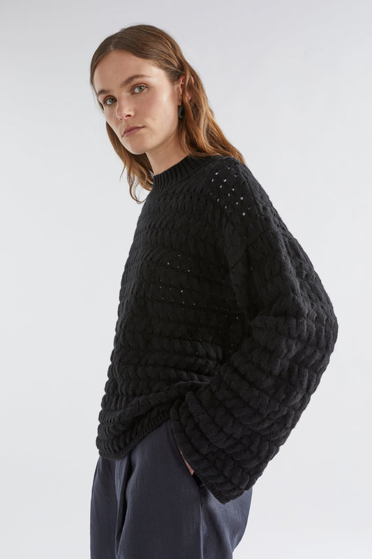 Koda Drop Shoulder Mock Neck Bubble Knit Sweater Model Angled Front | BLACK