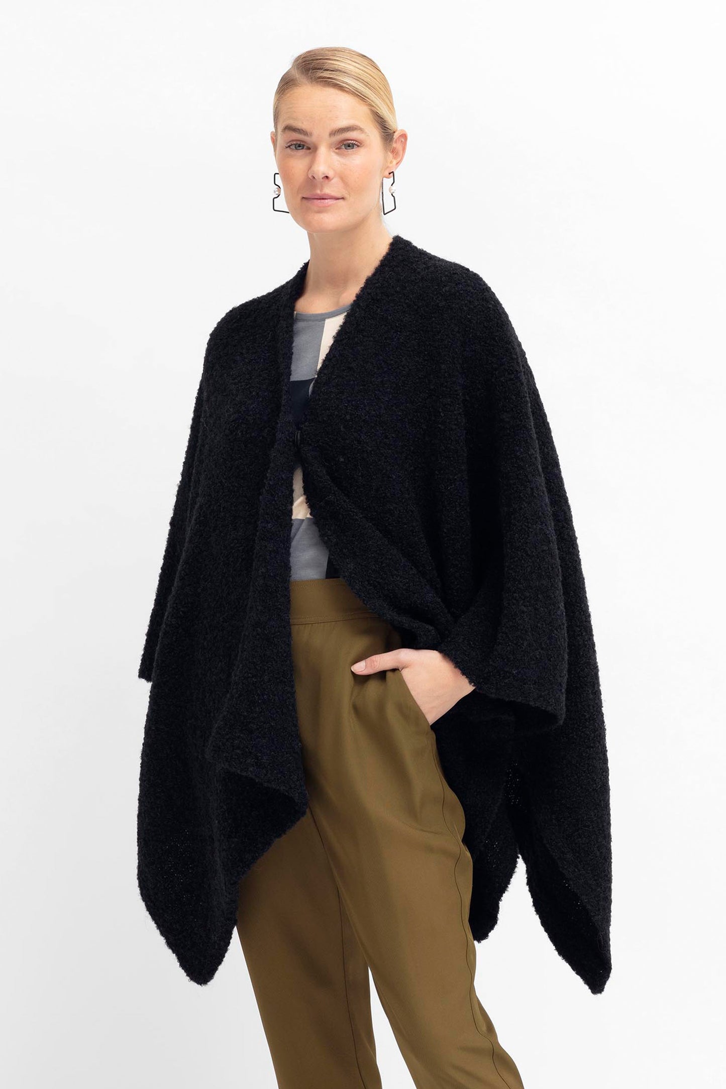 Tukko Alpaca-Wool Boucle Knit Handkerchief Hem Poncho Wrap Model Front | BLACK