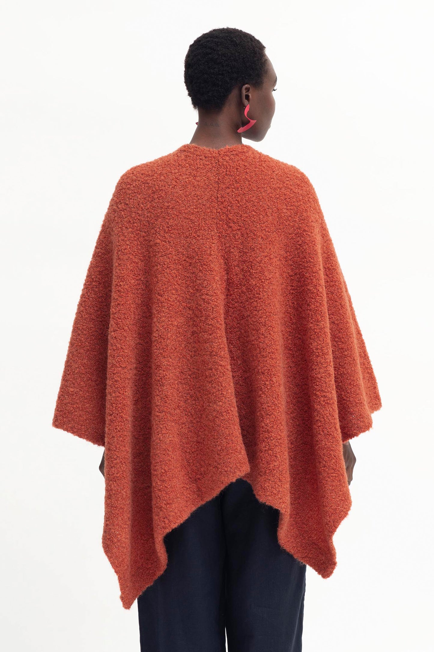 Tukko  Alpaca-Wool Boucle Knit Handkerchief Hem Poncho Wrap Model Back | CINNAMON