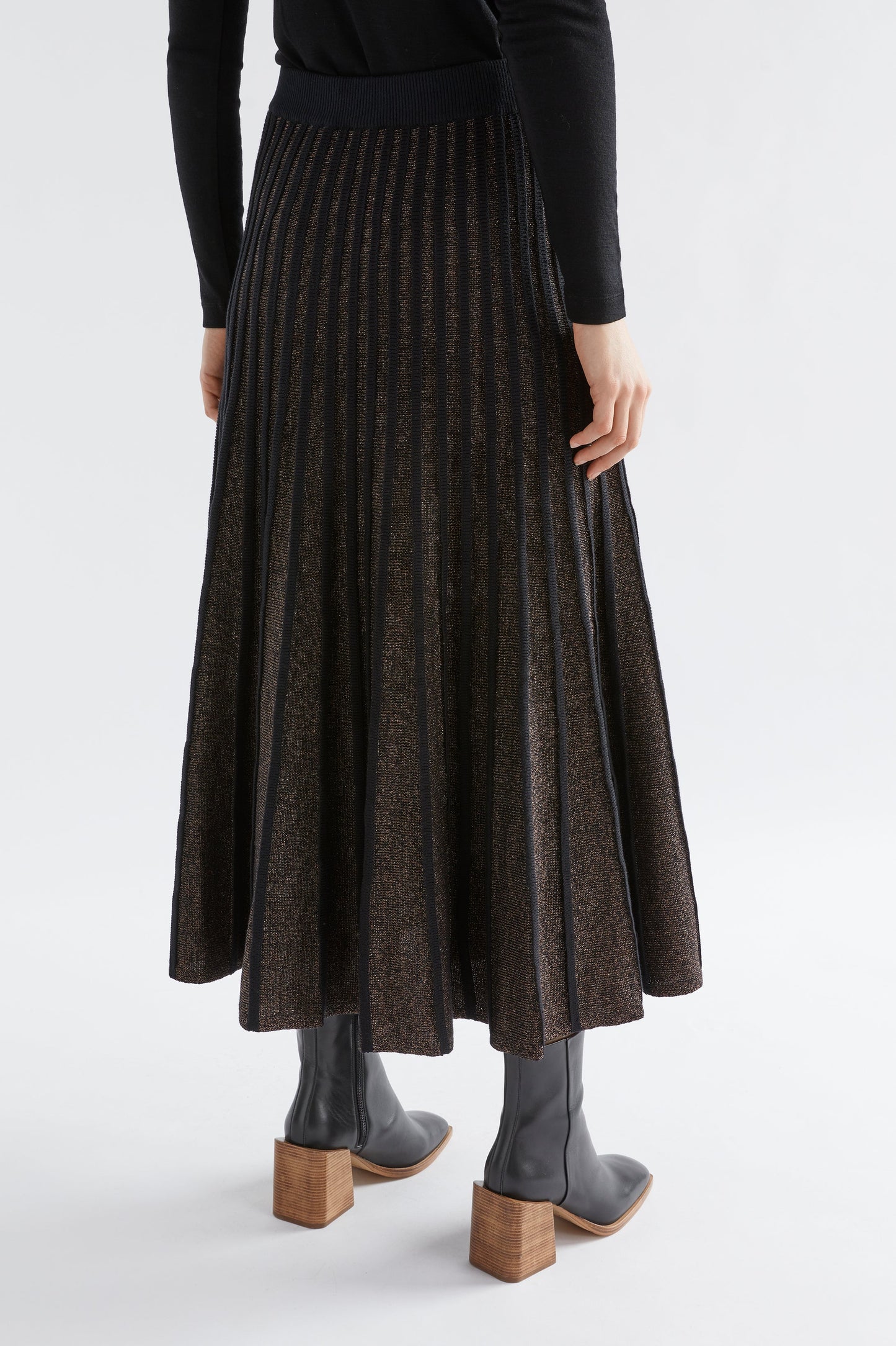 Glittra Lurex Knit Metallic A-Line Skirt Model Back Full Body | GOLDEN METALLIC