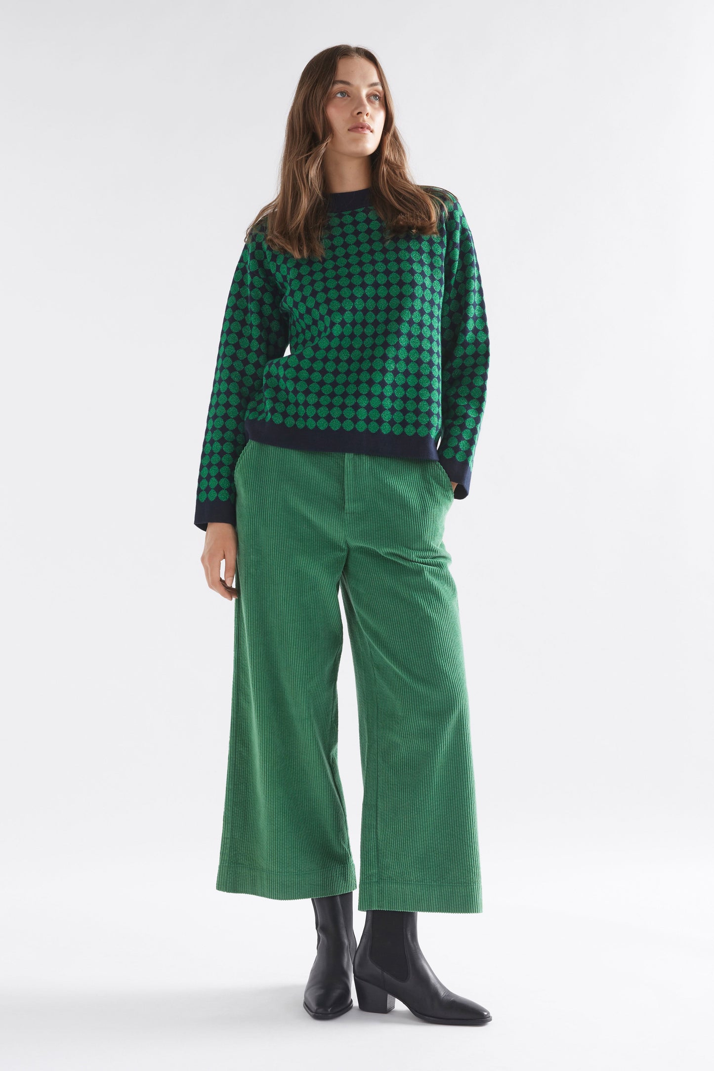 Leira Mock Turtle Neck Dropped Sleeve Metallic Circle Knit Sweater Model Front Full Body | NAVY GREEN METALLIC