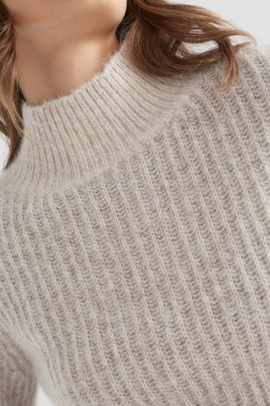 Kaanto Puff Sleeve Cropped Ribbed Turtle Neck Sweater Model Front detail | ECRU