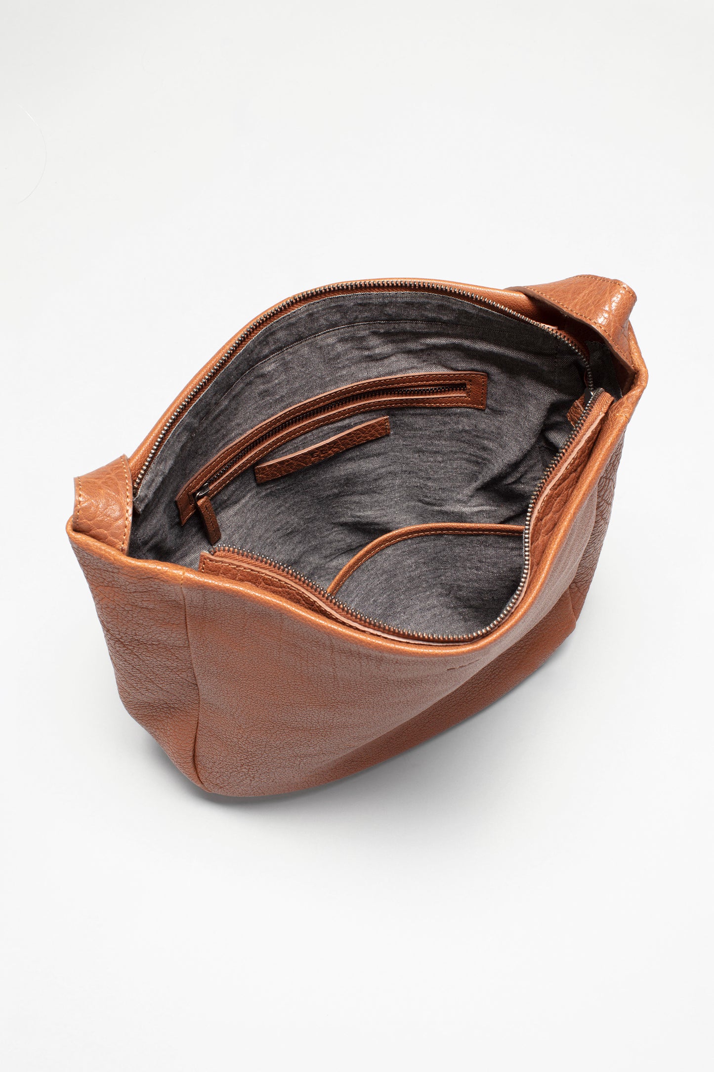 Sirki Leather Curved Bottom Crossbody Large Bag Internal TAN