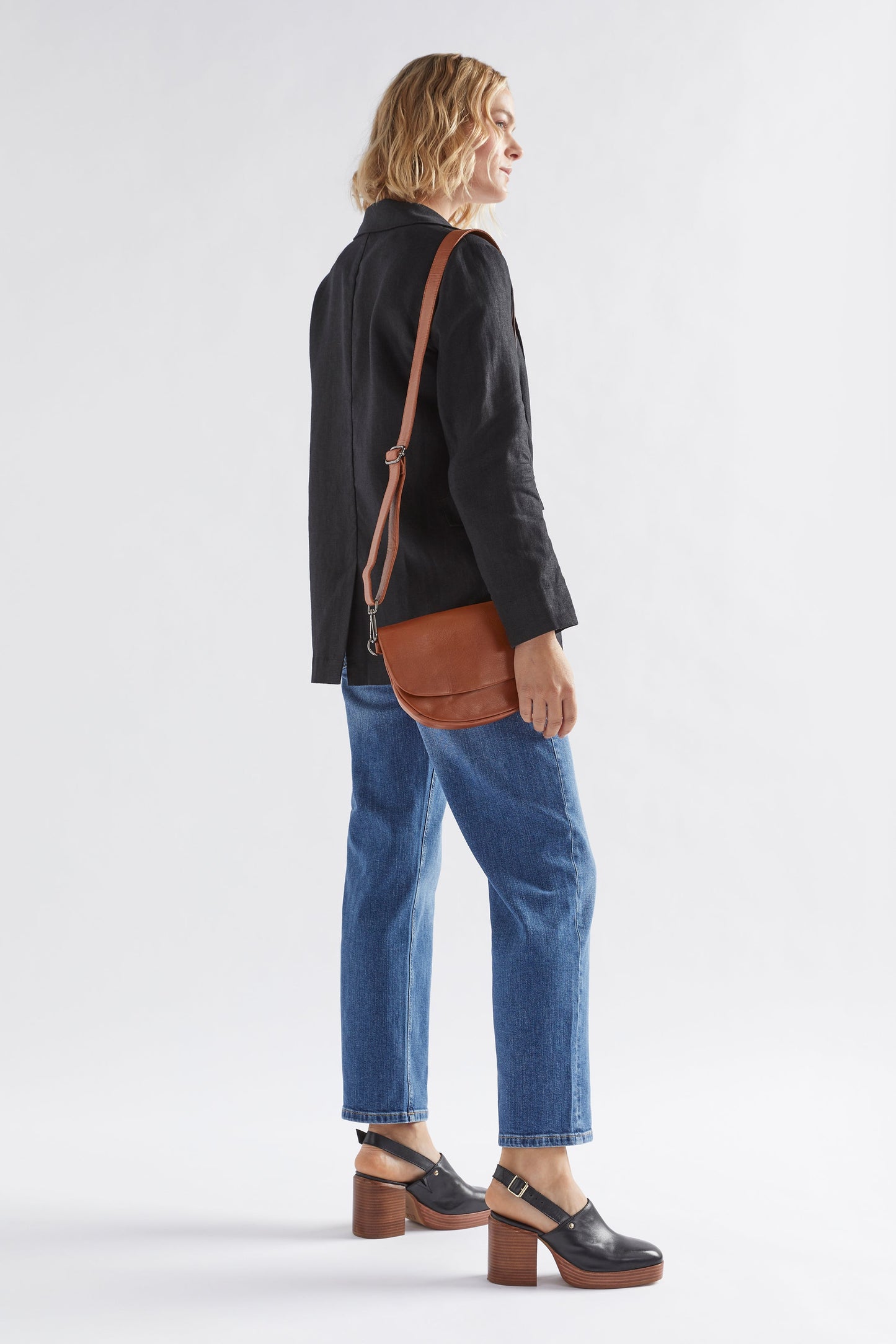 Otta Half Moon Leather Cross Body Bag Front model full body | TAN
