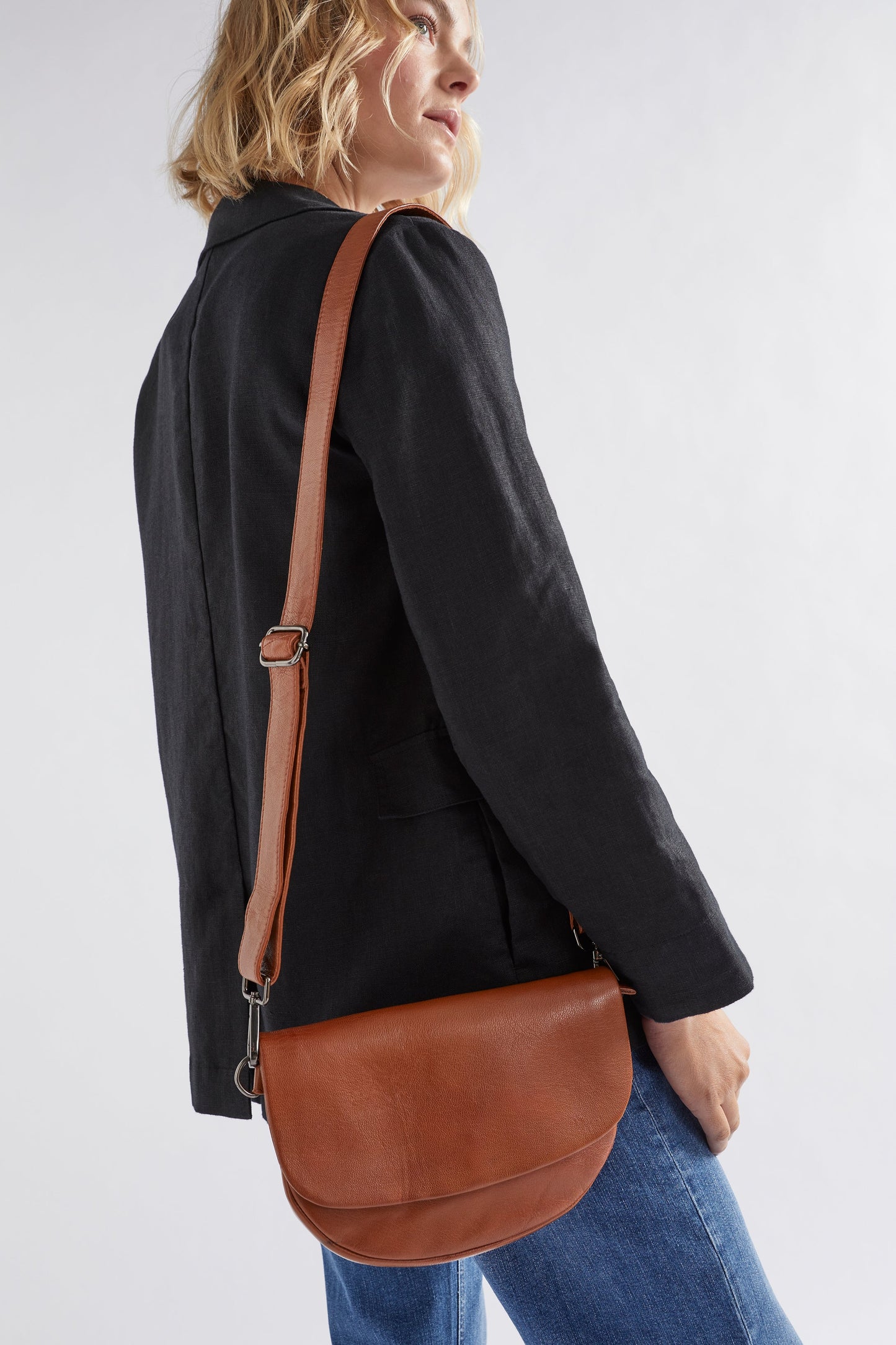 Otta Half Moon Leather Cross Body Bag Front Model  | TAN