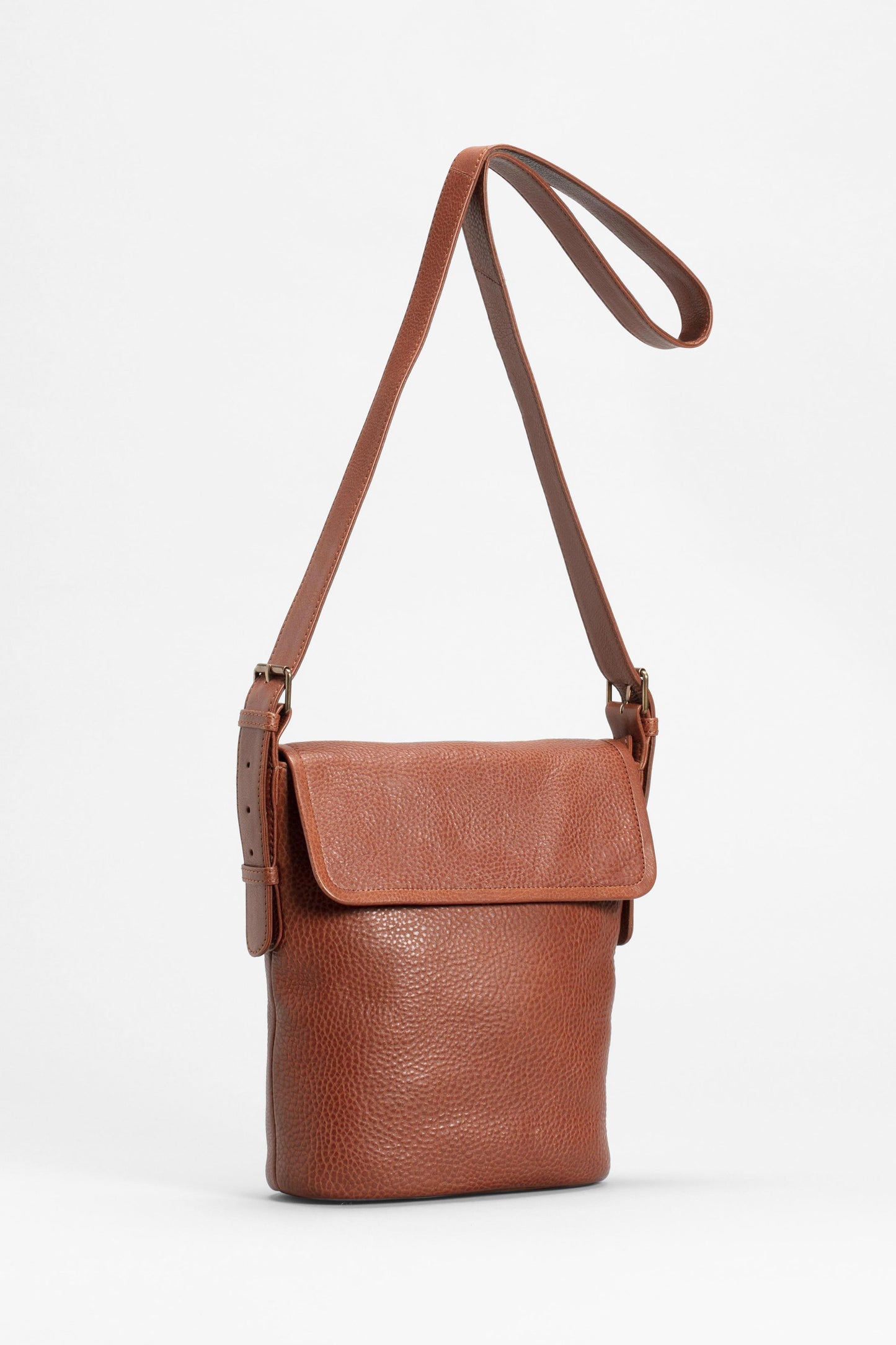 Teo Medium sized Leather Crossbody Bag with flap front TAN
