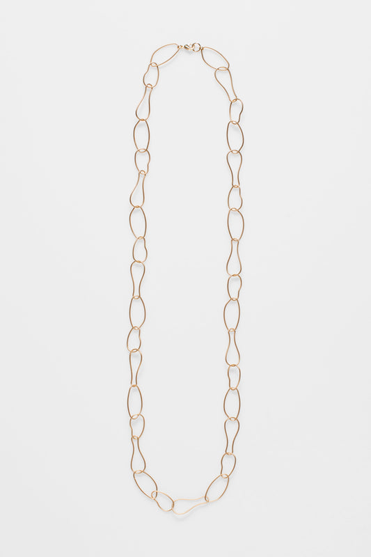 Niika Fine Organic Shaped Chain Coated Metal Necklace Flat | GOLD