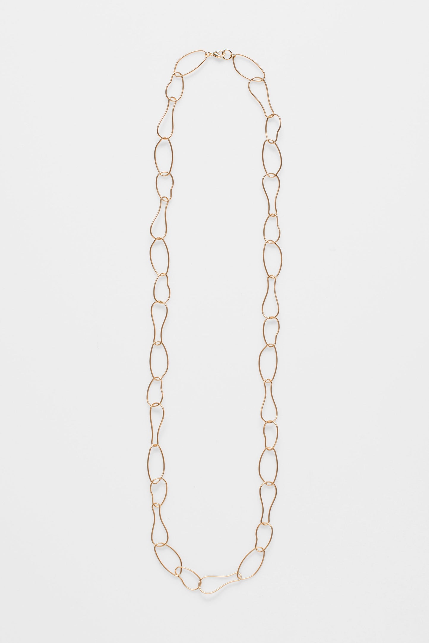 Niika Fine Organic Shaped Chain Coated Metal Necklace Flat | GOLD