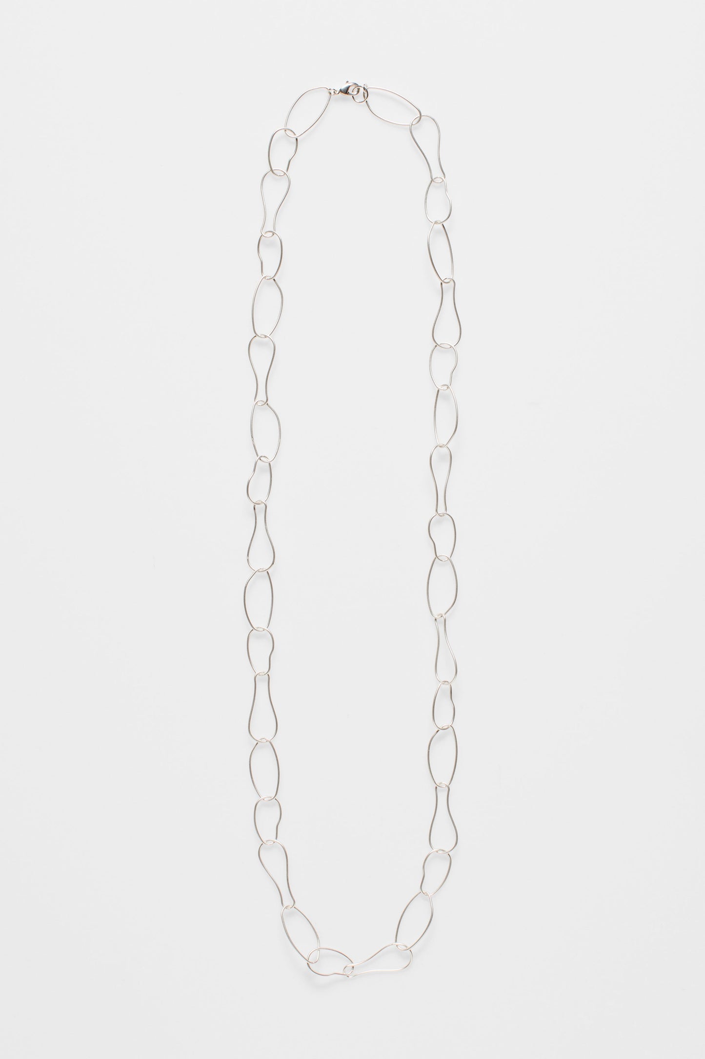 Niika Fine Organic Shaped Chain Coated Metal Necklace flat | SILVER