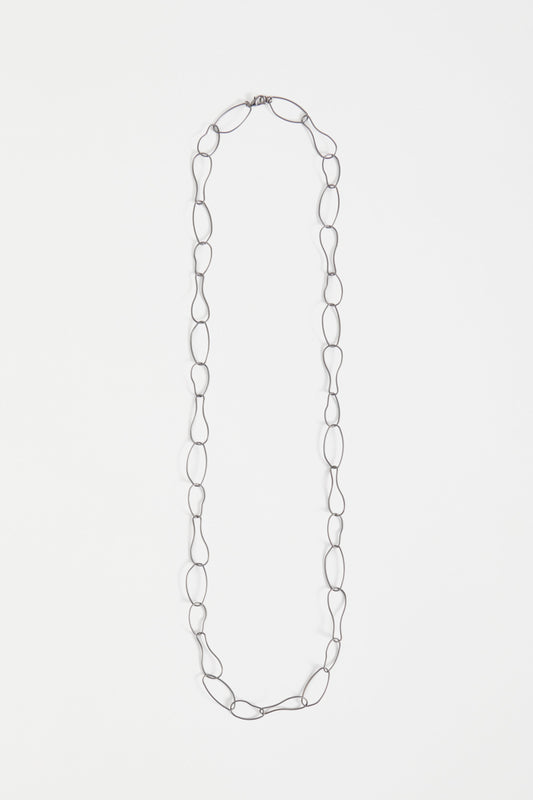 Niika Fine Organic Shaped Chain Coated Metal Necklace Flat | GUNMETAL