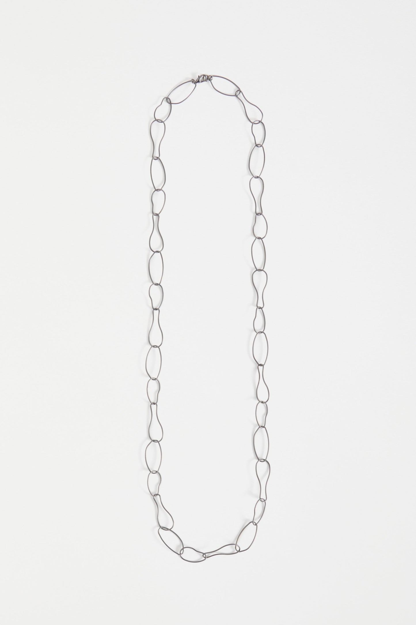Niika Fine Organic Shaped Chain Coated Metal Necklace Flat | GUNMETAL