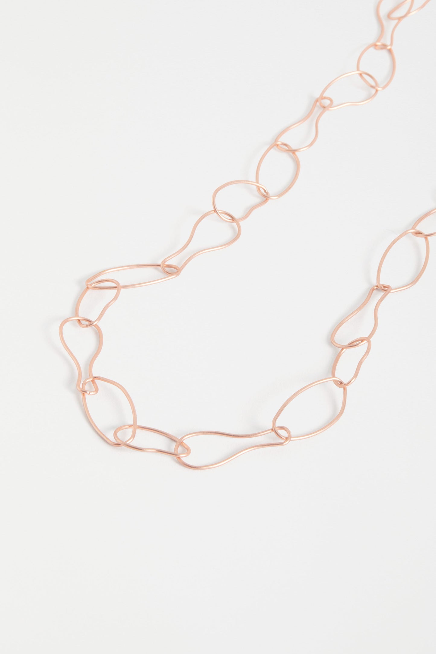 Niika Fine Organic Shaped Chain Coated Metal Necklace Detail | ROSE GOLD