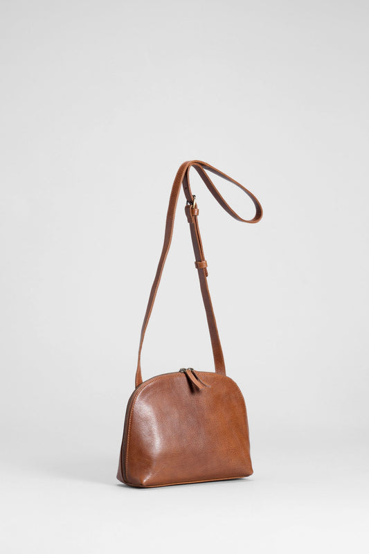 Orcas Half Moon Zip Up Small Leather Bag front | Tan